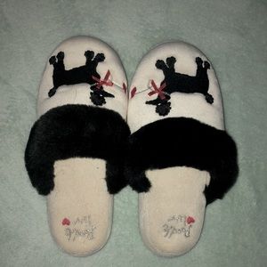 white and black slippers
